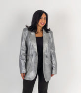 The Genuine Grace – Metallic Silver Leather Blazer
Double-breasted