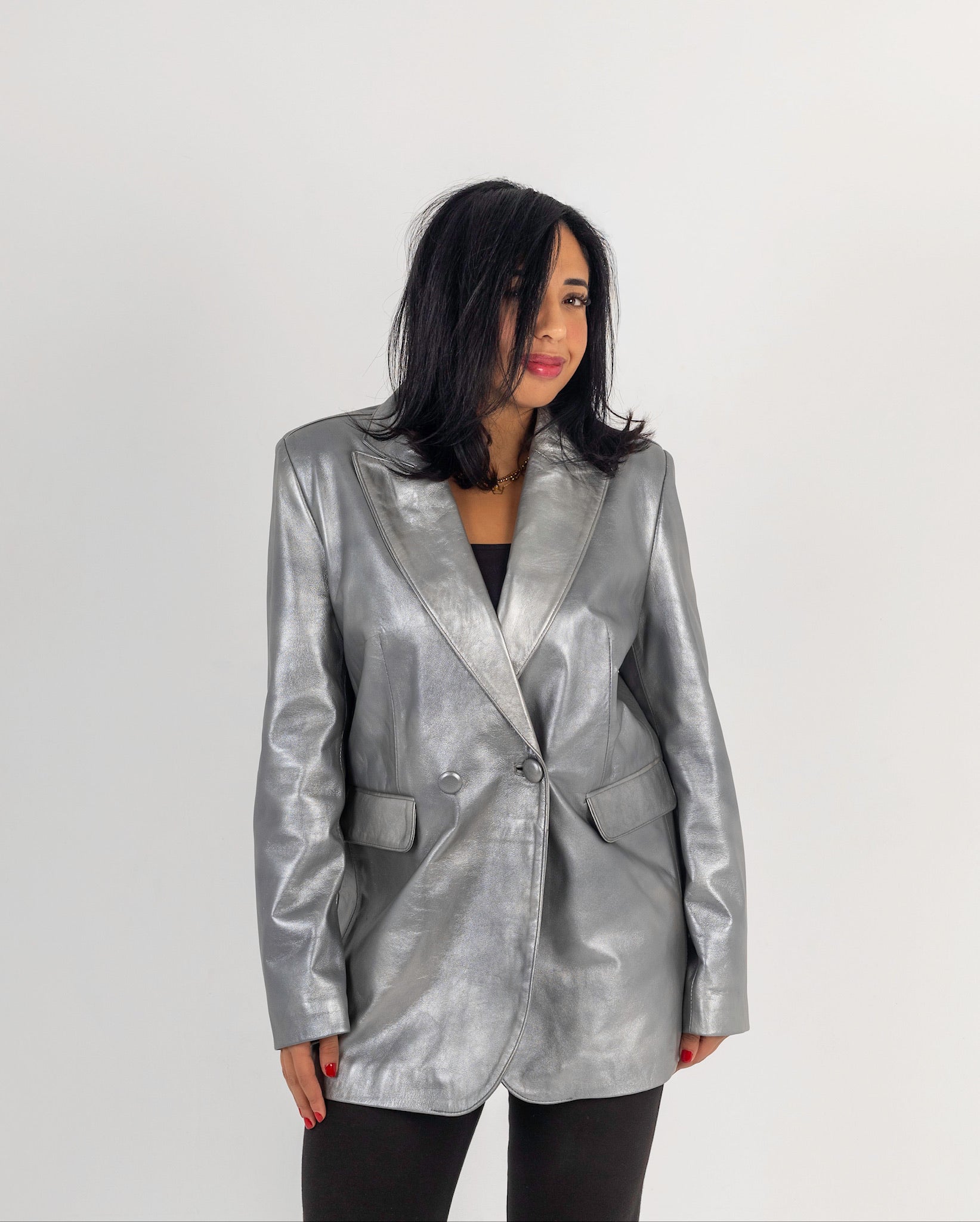 The Genuine Grace – Metallic Silver Leather Blazer
Double-breasted
